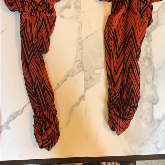 Black and orange sleeveless tribal jumpsuit - Picture 3 of 3